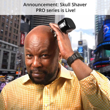 A man shaving with Skull shaver in a busy street with title Announcement: Skull Shaver PRO Head & Face Shaver is LIVE