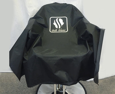 Barber's Hair Cutting Cape with a logo of skull shaver on the cape 