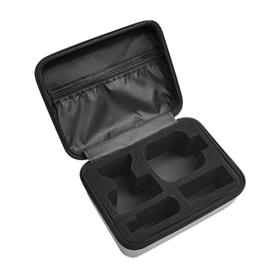 An open Pitbull Deluxe Travel Case with a black interior, featuring custom foam compartments designed for securely holding grooming tools and accessories. The lid includes a mesh pocket for additional storage, emphasizing practicality and organization.
