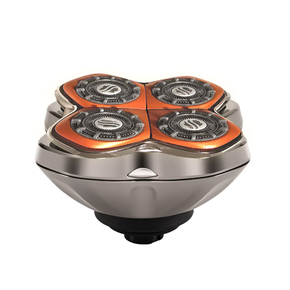 Electric rotary shaver with a modern design, featuring four circular shaving heads arranged in a clover-like pattern. The heads of the Skull Shaver Rugged™ Blade  have an orange and silver color scheme with intricate detailing and a stylized ‘S’ logo at the center. The body is sleek and metallic, curving into a rounded ergonomic base, suggesting a comfortable grip for shaving.