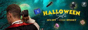  Skull Shaver promotional banner features a man dressed as a vampire shaves the back of his head with a Skull Shaver against a spooky, moonlit background featuring a haunted house and eerie trees. Floating Skull Shaver products surround him, including electric shavers and accessories. The Skull Shaver logo appears in the top right. Bold yellow text reads "HALLOWEEN Sale," with smaller text below stating "10% OFF | CODE: SPOOKY."
