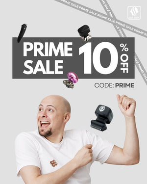 A wide promotional banner for a Skull Shaver Prime Sale. The text "PRIME SALE 10% OFF" is displayed in a large, white, bold font on a central dark gray rectangle. The CODE: PRIME is written below the main text. A very excited, smiling bald man in a white t-shirt gestures toward the sale offer. Several different Skull Shaver products are scattered around the man's head and the sale banner. The Skull Shaver logo is in the top right corner. 