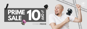 A wide promotional banner for a Skull Shaver Prime Sale. The text "PRIME SALE 10% OFF" is displayed in a large, white, bold font on a central dark gray rectangle. The CODE: PRIME is written below the main text. A very excited, smiling bald man in a white t-shirt gestures toward the sale offer. Several different Skull Shaver products are scattered around the man's head and the sale banner. The Skull Shaver logo is in the top right corner. 