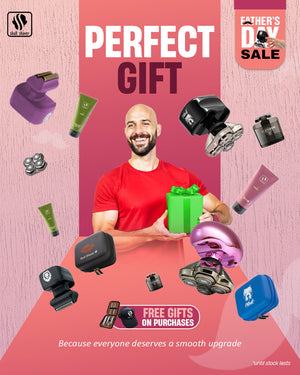 Skull Shaver Father's Day Sale banner featuring the 'Perfect Gift.' A joyful man holds a green gift box, surrounded by various Skull Shaver products, including shavers, grooming kits, and travel cases. Text: 'Because everyone deserves a smooth upgrade.' Includes the offer: 'Free gifts on purchases.' Limited stock available.