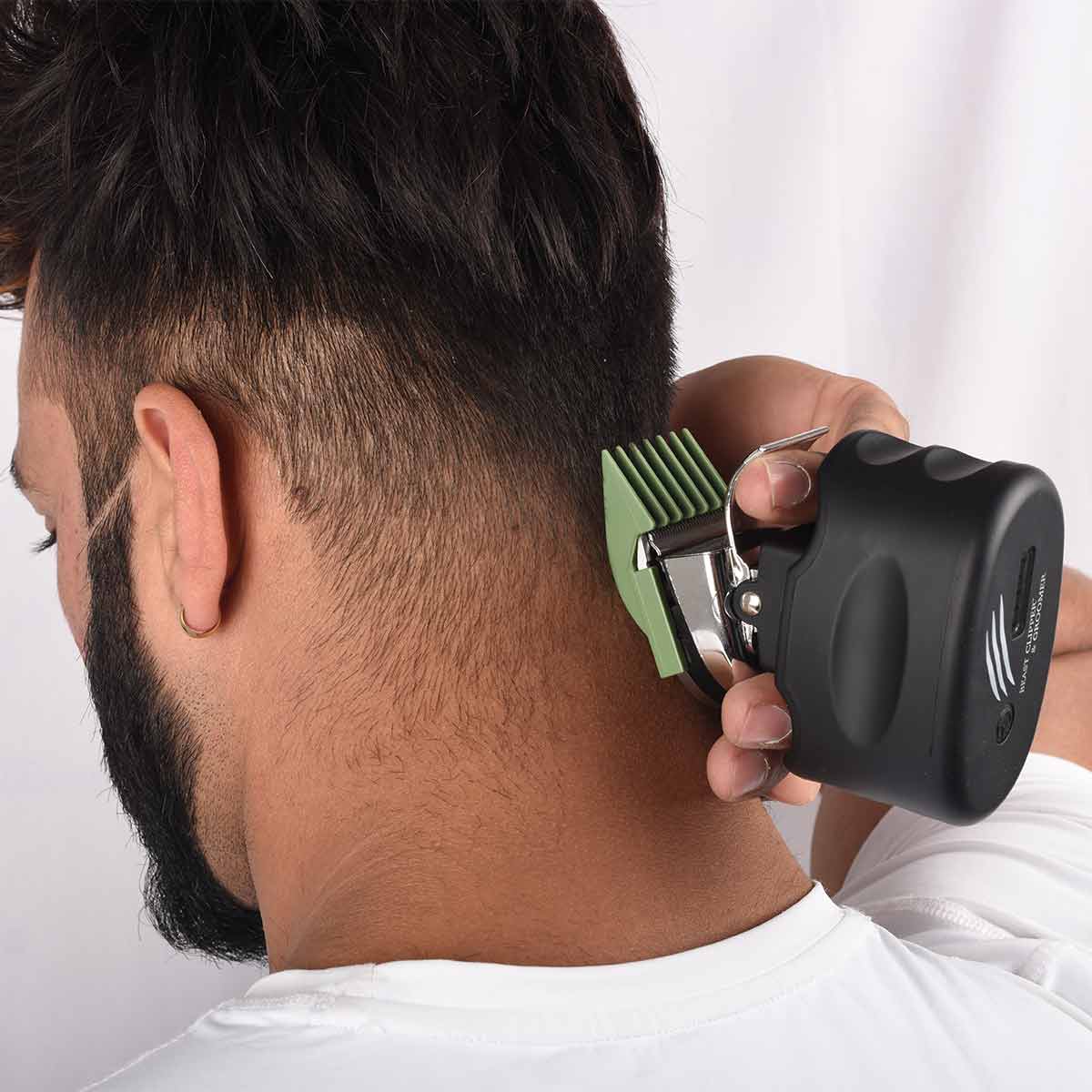 the patented design lets you grip the beast clipper between your fingers. thos grip makes it easy to trim the hair on the back of your head