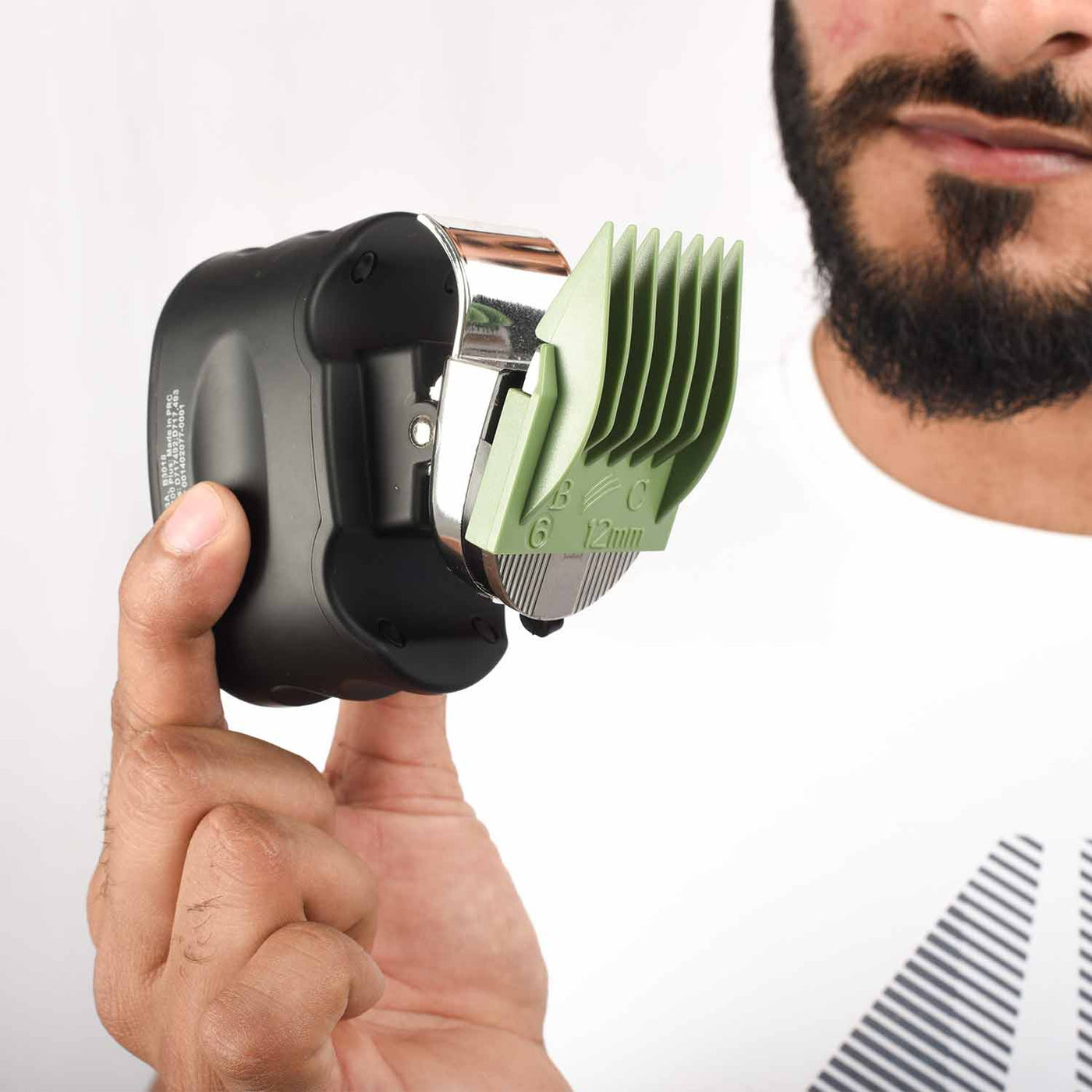 the beast clipper PRO can also be gripped by the handle to give you flexibility. combs slide on and off the blades and click into place when fully installed.